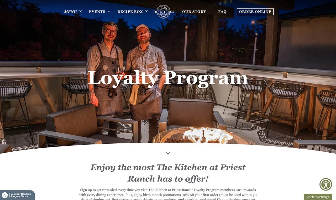 the kitchen at priest ranch loyalty program page with a nice image of the chef, Dan, and a waiter by the rooftop deck fire pit
