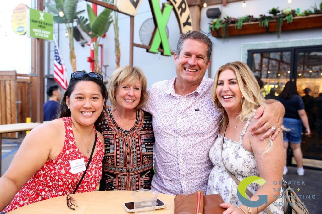 Andrea Villanueva socializing with colleagues and clients at GSMC