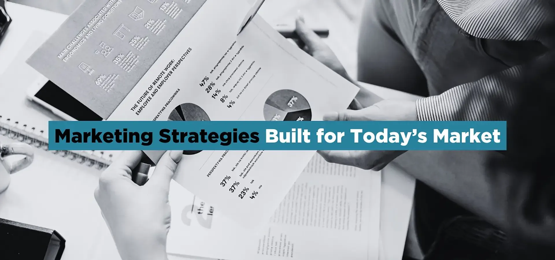 Marketing professionals reviewing analytics and campaign performance data for homebuilder digital marketing strategies.